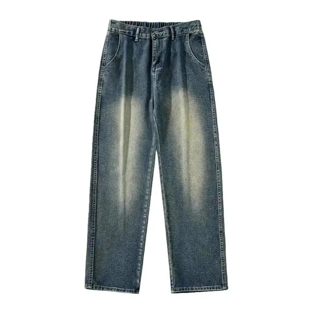 Floor-length men's stonewashed jeans