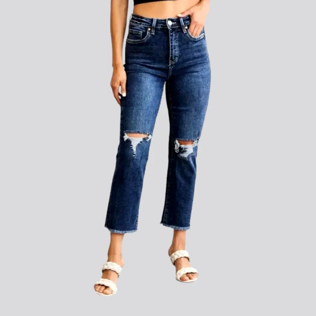 Frayed women's high-waist jeans