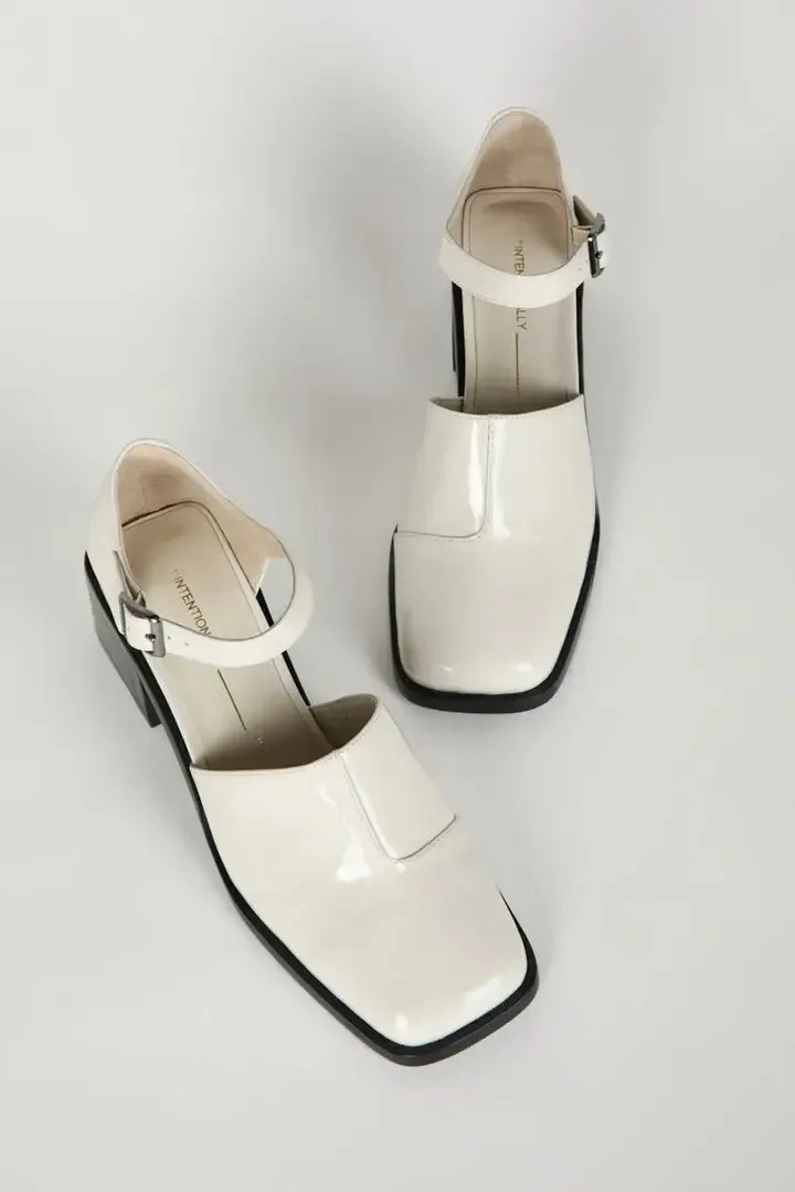 IB MARTY PATENT MARY JANE HEELS IN WHITE